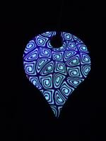 Pendentif millefiori à spirales en pâte polymère
