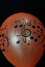 25 Ballons fluo note de musique UV