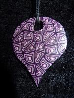 Pendentif millefiori à spirales en pâte polymère